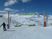 Vaste zone de « ski tranquille », composée de diverses pistes, disponible près de la gare amont du téléphérique 3S L'Olympique à Val d´Isère