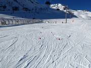 Zone débutants à Les Agudes Village avec tapis roulant
