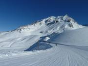 Large piste de liaison vers le Grand Col