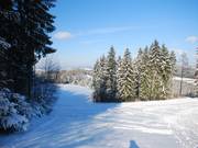 Il arrive que la partie inférieure de la piste ne puisse pas être préparée en raison du manque de neige.