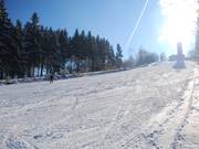 La pente supérieure dans toute sa longueur