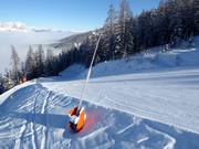 Enneigement par canons à neige dans le domaine skiable Galsterberg