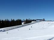 Piste d'entraînement avec tapis roulant à la station supérieure de la télécabine