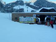 Grand panneau d'information au télésiège Palüdbahn