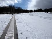 Tapis roulant à la station de vallée de la télécabine