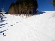 La télécabine huit places du Sürenberg dessert deux pistes.