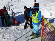 Assistance pour l'embarquement au téléski