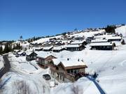 Chalets en rondins avec accès direct aux pistes (ski-in/ski-out)