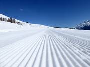 Préparation parfaite des pistes dans le domaine skiable de Zuoz