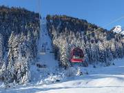 Almkopfbahn - Téléphérique monocâble composé de sièges à 6 places et de cabines à 8 places