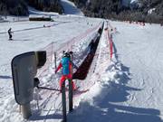 Krispini Express (tapis roulant de 176 m)