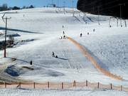 Petite piste de luge à côté des pistes faciles