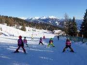 Cours de ski au téléski d'entraînement Bidner