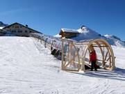Förderband Valisera - Tapis roulant/Moving Carpet recouvert d’une galerie