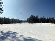 Large et piste plate dans la partie supérieure