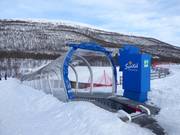 Tännporten - Tapis roulant/Moving Carpet recouvert d’une galerie