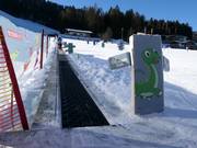 Zauberteppich Triassic Kinderland - Tapis roulant/Moving Carpet