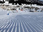 Préparation parfaite des pistes dans le domaine skiable de Lermoos