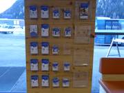 Mise à disposition gratuite de plans des pistes à la caisse