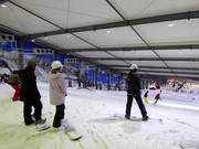 Départ de la piste dans le hall de ski Snowplanet
