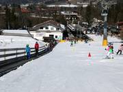 Tapis roulant à la station de départ de la télécabine