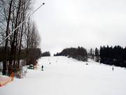 La large pente finale au-dessus de la station de vallée