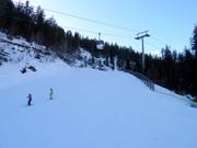 Piste 64 descente vers la vallée Laax