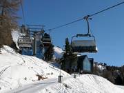 Obereggen-Oberholz - 4 places | Télésiège rapide (débrayable) avec capots de protection