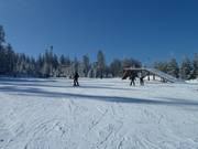 Piste large et plate
