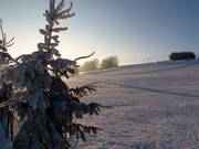 Lever du soleil sur le domaine skiable Halde