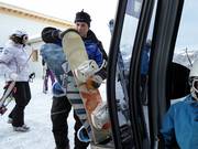 Assistance à l’embarquement dans la télécabine