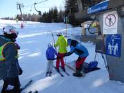 Assistance pour l'embarquement au téléski