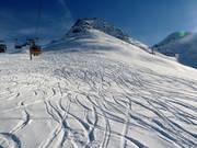 Descentes en poudreuse au télésiège de Rojen