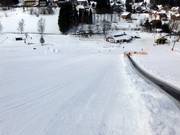 Piste facile au tapis roulant dans la vallée
