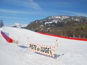 Piste de luge à Praz sur Arly, près de la station de départ du télésiège Crête du Midi