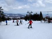 Cours de ski à la station supérieure