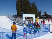 Kinderland C4 - Tapis roulant recouvert d’une galerie