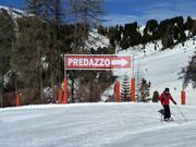 Panneau direction Predazzo