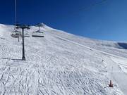 Pente de poudreuse au télésiège 8 places Familienglück