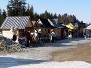 Chalets à côté des parkings