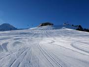 Large piste vers le télésiège Arzjochbahn