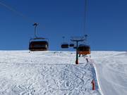 Campo-Lastè - 4 places | Télésiège rapide (débrayable) avec capots de protection