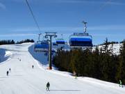 Bernkogel 6er - 6 places | Télésiège rapide (débrayable) avec capots de protection et sièges chauffants