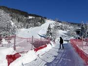 Descente sud avec pont de ski (depuis 2018)