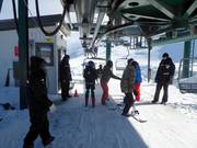 Assistance à l’embarquement au télésiège