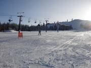 Large et facile piste dans le domaine skiable Soda Springs