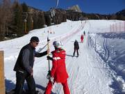Assistance à l’embarquement au téléski à assiettes