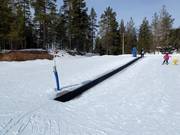 Tapis roulant avec pente d'entraînement
