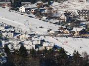 Bâti dense autour du Sonnenhang. Beaucoup de maisons proposent des appartements de vacances.