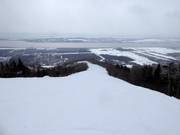 Piste La Crête avec vue sur le fleuve Saint-Laurent et l'Île d'Orléans